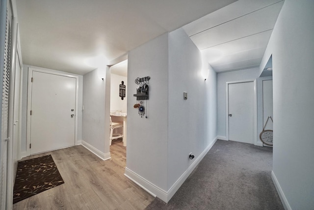 603 S River Rd Unit 2K, Des Plaines, IL 60016 - corridor featuring baseboards and light wood-type flooring