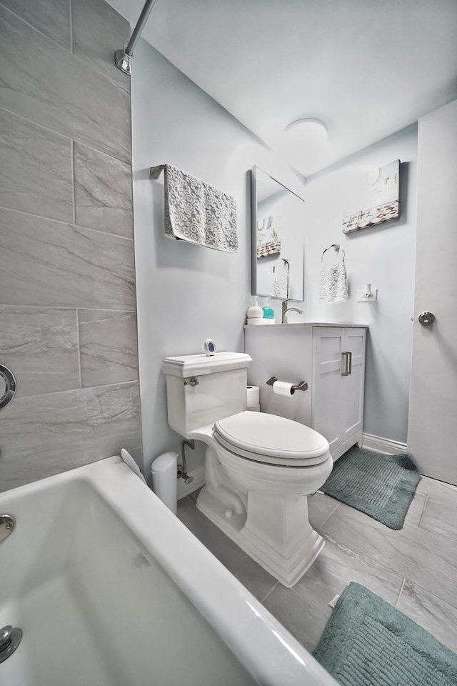 603 S River Rd Unit 2K, Des Plaines, IL 60016 - bathroom featuring toilet, vanity, shower / bath combination, and baseboards
