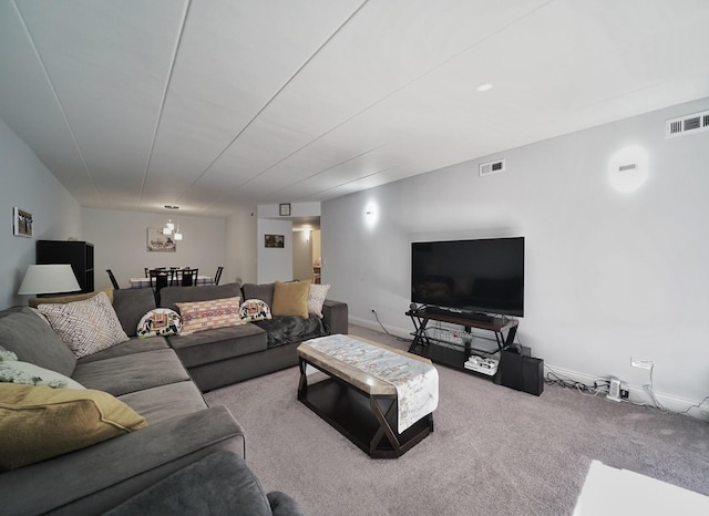603 S River Rd Unit 2K, Des Plaines, IL 60016 - living area featuring baseboards and carpet