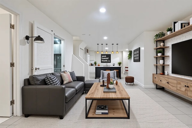 2847 N Wolcott Ave Unit D, Chicago, IL 60657 - living room featuring light tile patterned floors, recessed lighting, and baseboards