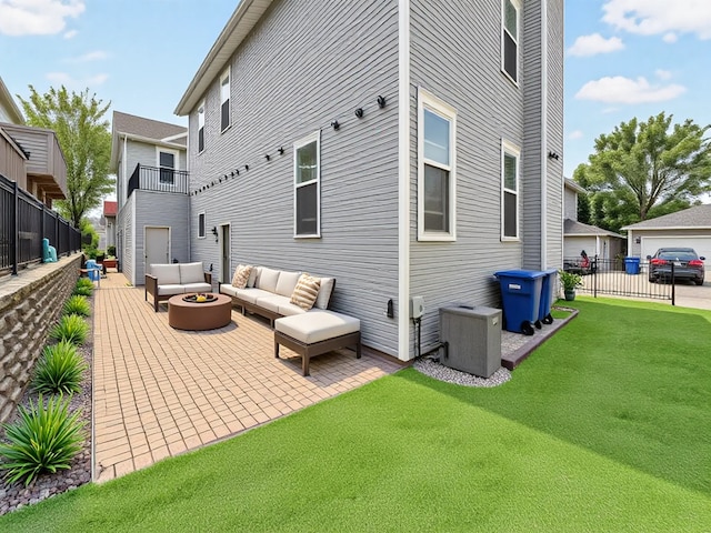 2847 N Wolcott Ave Unit D, Chicago, IL 60657 - back of property with an outdoor living space with a fire pit and a patio