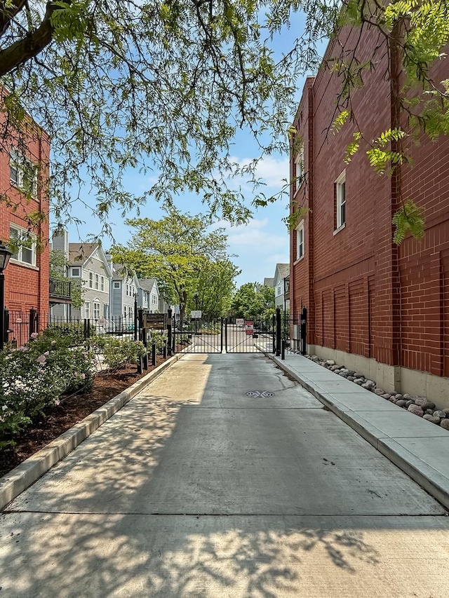 2847 N Wolcott Ave Unit D, Chicago, IL 60657 - view of street with a residential view, a gate, curbs, and a gated entry