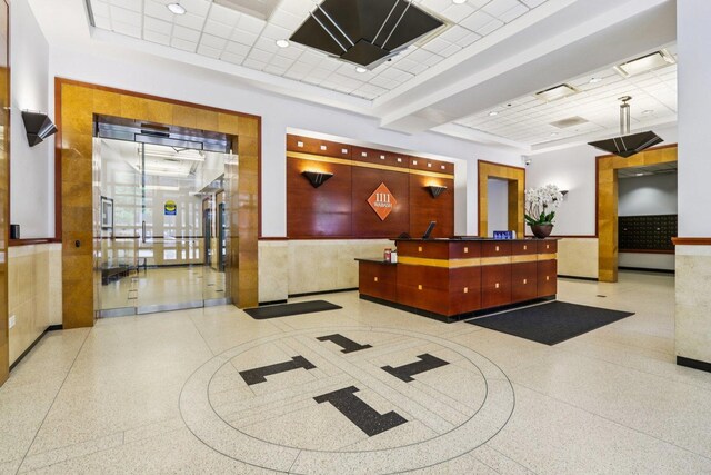 1111 S Wabash Ave Unit 1410, Chicago, IL 60605 - reception area with a paneled ceiling and wainscoting