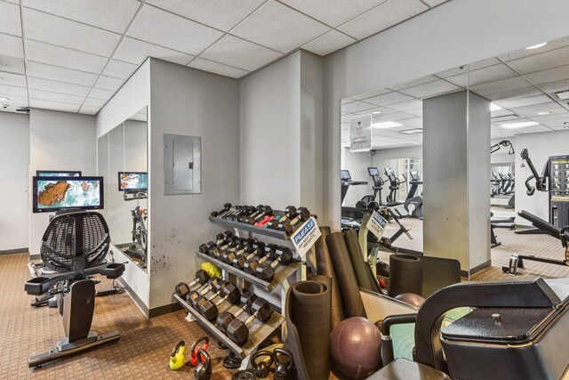 1111 S Wabash Ave Unit 1410, Chicago, IL 60605 - workout area featuring a paneled ceiling, electric panel, carpet floors, and baseboards