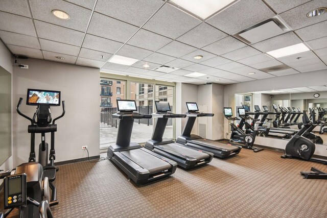 1111 S Wabash Ave Unit 1410, Chicago, IL 60605 - gym featuring a paneled ceiling, carpet flooring, and baseboards