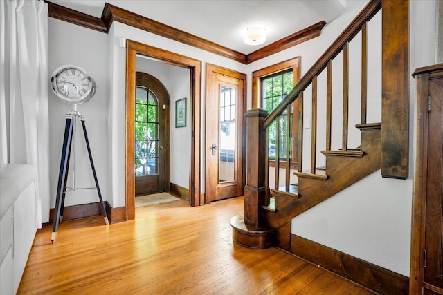 336 S Sleight St, Naperville, IL 60540 - entrance foyer featuring plenty of natural light, crown molding, baseboards, light wood-type flooring, and stairs