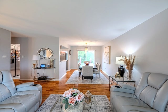 8106 W 89th Pl, Hickory Hills, IL 60457 - living room featuring light wood finished floors and baseboards