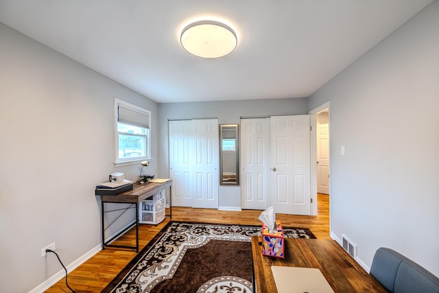 8106 W 89th Pl, Hickory Hills, IL 60457 - home office with light wood-style flooring and baseboards