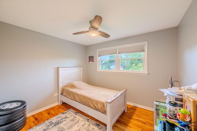 8106 W 89th Pl, Hickory Hills, IL 60457 - bedroom featuring light wood-style flooring, baseboards, and a ceiling fan