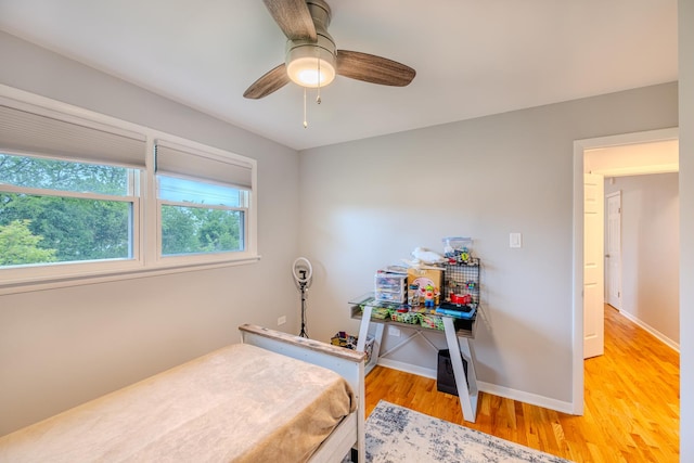 8106 W 89th Pl, Hickory Hills, IL 60457 - bedroom featuring light wood-style floors, baseboards, and a ceiling fan