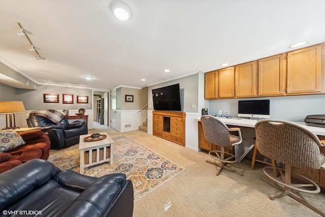 3S180 Cypress Dr, Glen Ellyn, IL 60137 - living room with ornamental molding, light carpet, a wainscoted wall, stairs, and rail lighting