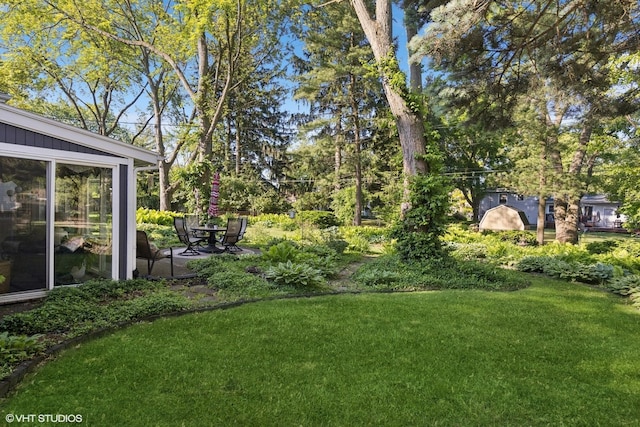 3S180 Cypress Dr, Glen Ellyn, IL 60137 - view of green lawn featuring a patio area