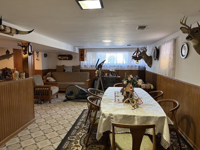 7711 Massasoit Ave, Burbank, IL 60459 - dining space featuring wood walls, wainscoting, and light flooring