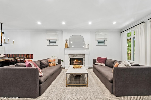 1959 W Berwyn Ave, Chicago, IL 60640 - living area featuring recessed lighting, a tile fireplace, a chandelier, and ornamental molding