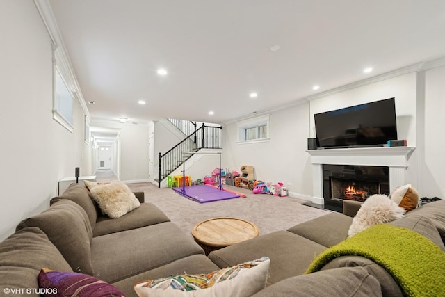 1959 W Berwyn Ave, Chicago, IL 60640 - living room featuring stairs, carpet floors, a warm lit fireplace, recessed lighting, and crown molding