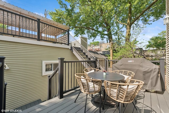 1959 W Berwyn Ave, Chicago, IL 60640 - deck featuring area for grilling, outdoor dining area, and stairs