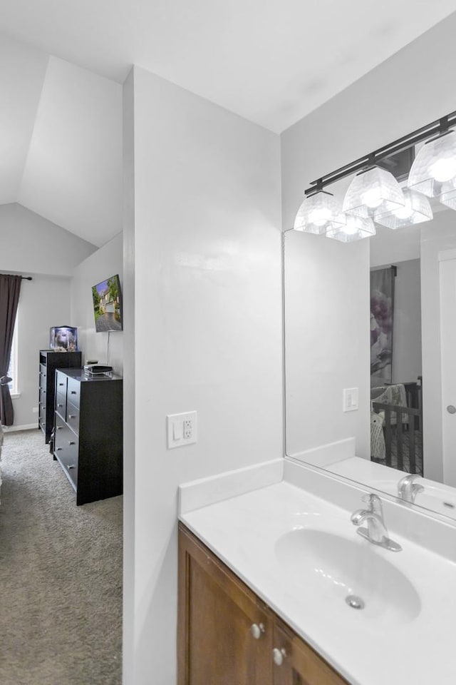 2439 Daybreak Ct Unit 2439, Elgin, IL 60123 - bathroom featuring vanity and lofted ceiling