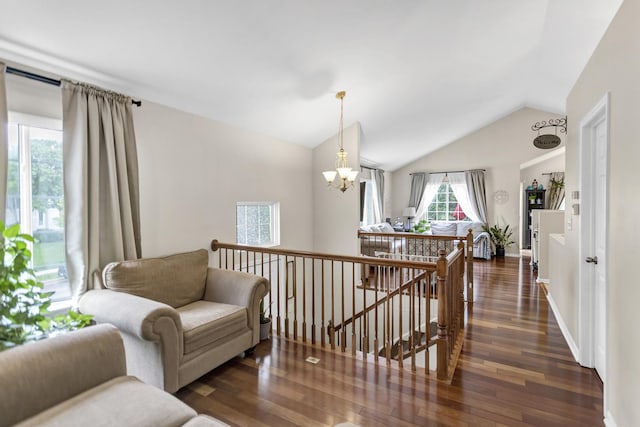 2439 Daybreak Ct Unit 2439, Elgin, IL 60123 - sitting room featuring an upstairs landing, wood finished floors, vaulted ceiling, and a chandelier