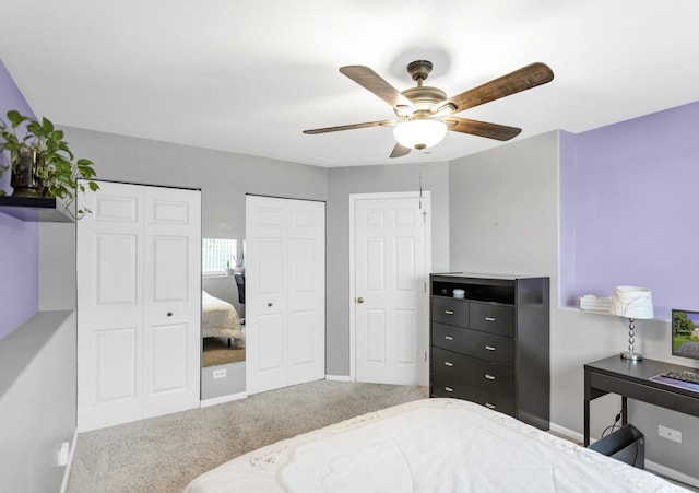 2439 Daybreak Ct Unit 2439, Elgin, IL 60123 - carpeted bedroom with two closets, baseboards, and a ceiling fan