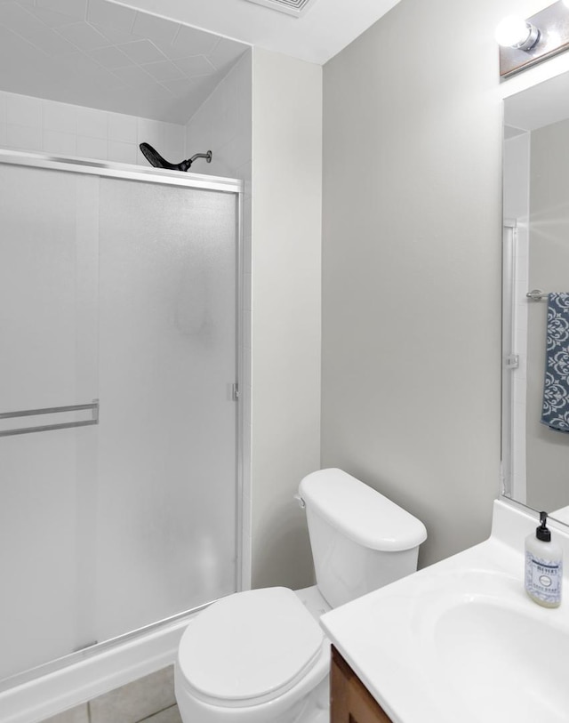 2439 Daybreak Ct Unit 2439, Elgin, IL 60123 - bathroom featuring vanity, a stall shower, and toilet
