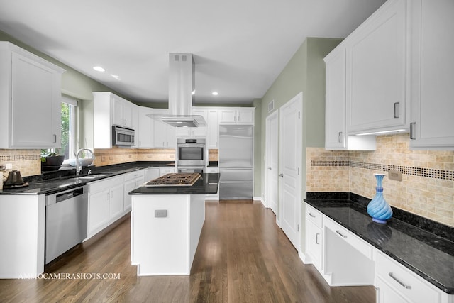 351 Tiger St, Bolingbrook, IL 60490 - kitchen featuring appliances with stainless steel finishes, island range hood, a sink, decorative backsplash, and recessed lighting