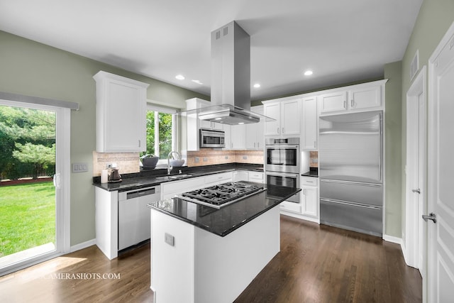 351 Tiger St, Bolingbrook, IL 60490 - kitchen featuring stainless steel appliances, island range hood, a sink, white cabinetry, and decorative backsplash