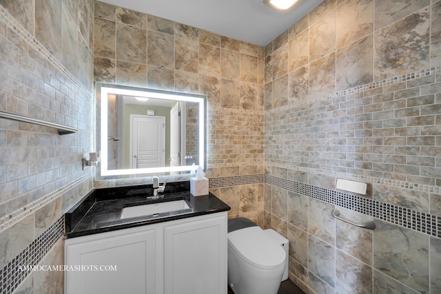351 Tiger St, Bolingbrook, IL 60490 - half bath with tile walls, vanity, and toilet