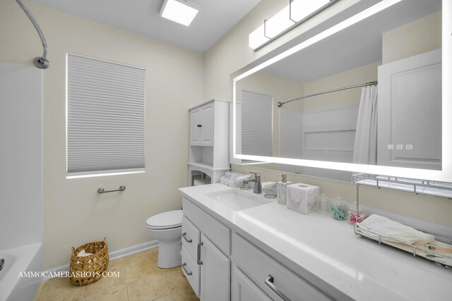 351 Tiger St, Bolingbrook, IL 60490 - full bath featuring vanity, toilet, tile patterned floors, baseboards, and shower / tub combo with curtain