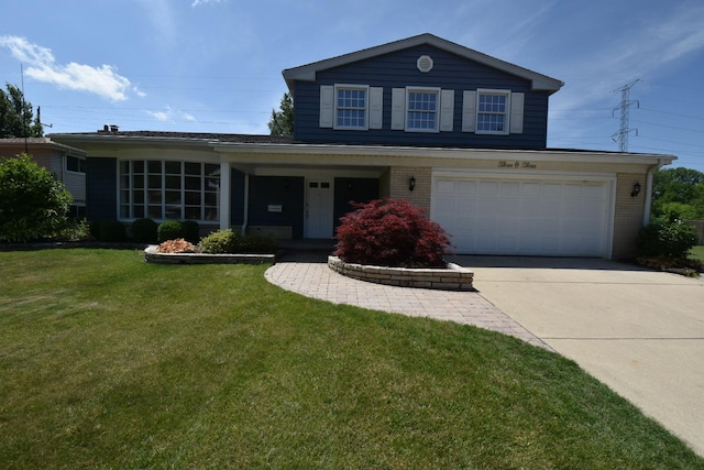 view of front of property with driveway, an attached garage, a front yard, and brick siding