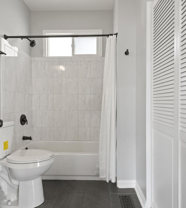 5123 W 23rd Pl, Cicero, IL 60804 - full bathroom featuring tile patterned flooring, shower / tub combo, toilet, and a closet