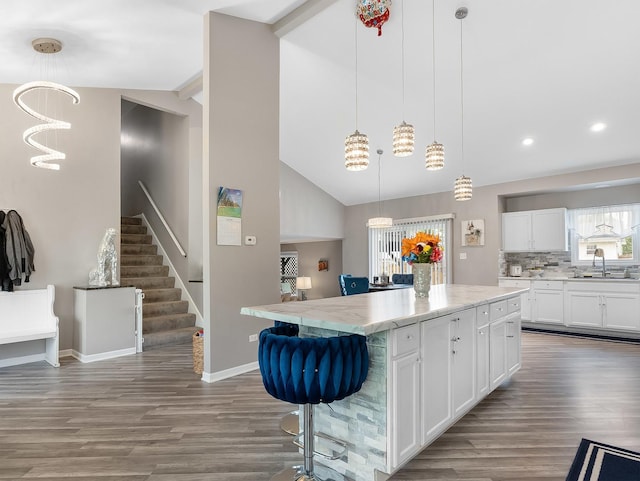 1811 Cumberland Dr, Plainfield, IL 60586 - kitchen featuring a sink, wood finished floors, baseboards, a center island, and recessed lighting