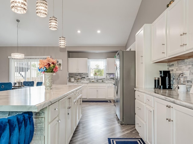 1811 Cumberland Dr, Plainfield, IL 60586 - kitchen featuring freestanding refrigerator, a sink, decorative backsplash, light wood finished floors, and recessed lighting