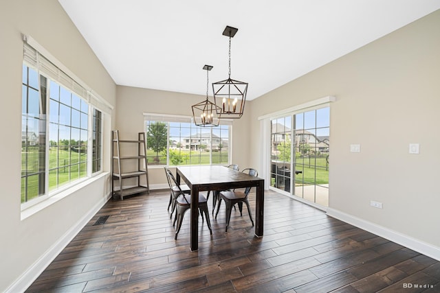 8500 Dungarvan Rd, Frankfort, IL 60423 - dining room with healthy amount of natural light, a chandelier, baseboards, and dark wood-style floors