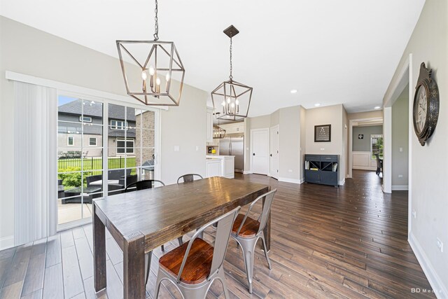 8500 Dungarvan Rd, Frankfort, IL 60423 - dining area with a chandelier, dark wood finished floors, baseboards, and recessed lighting