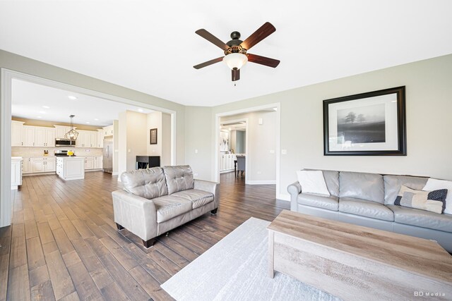 8500 Dungarvan Rd, Frankfort, IL 60423 - living area with ceiling fan, dark wood-type flooring, baseboards, and recessed lighting