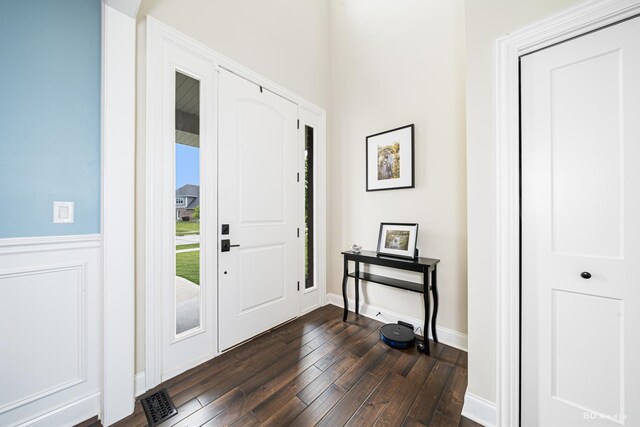 8500 Dungarvan Rd, Frankfort, IL 60423 - entryway with dark wood finished floors and wainscoting