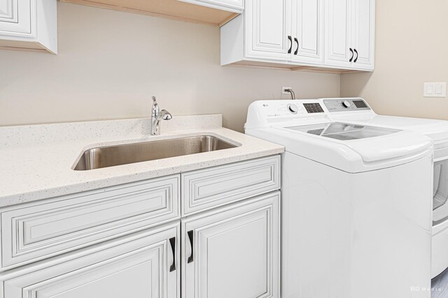 8500 Dungarvan Rd, Frankfort, IL 60423 - laundry area with cabinet space and separate washer and dryer