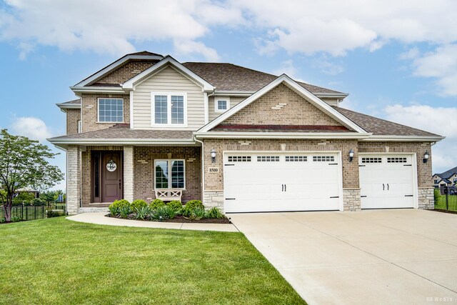 8500 Dungarvan Rd, Frankfort, IL 60423 - craftsman inspired home featuring an attached garage, concrete driveway, roof with shingles, and brick siding