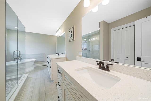 8500 Dungarvan Rd, Frankfort, IL 60423 - full bath with two vanities, a stall shower, and a freestanding tub