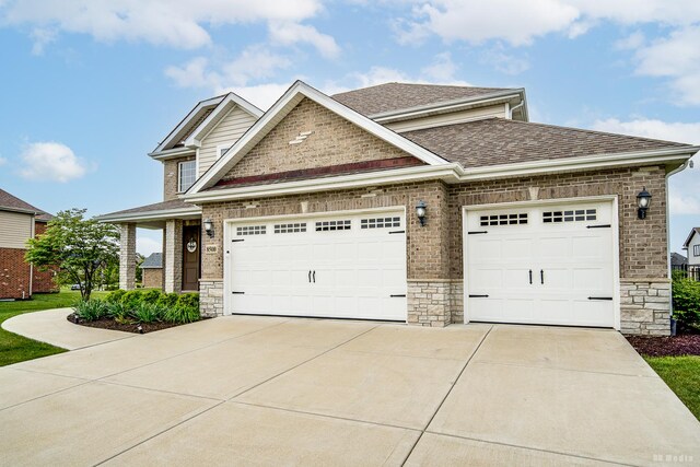 8500 Dungarvan Rd, Frankfort, IL 60423 - view of front of house featuring roof with shingles, driveway, a garage, and stone siding