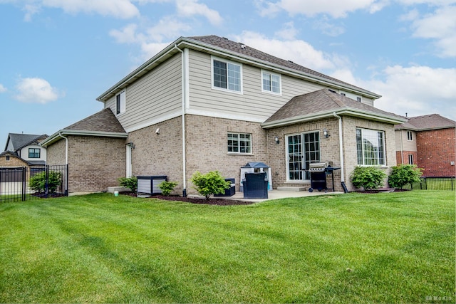 8500 Dungarvan Rd, Frankfort, IL 60423 - rear view of property featuring a patio area, brick siding, and roof with shingles