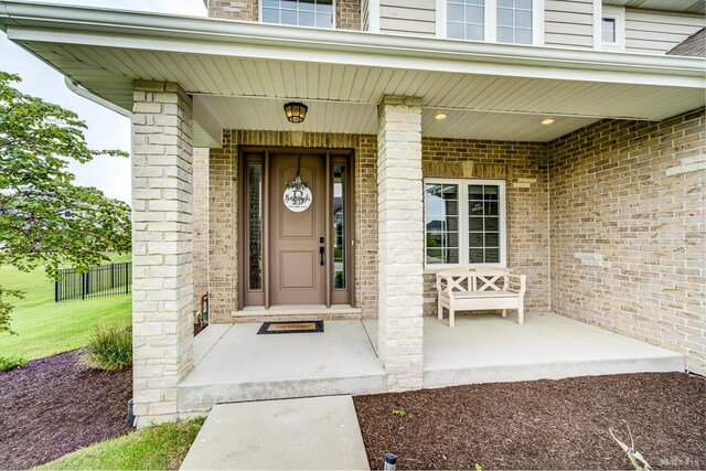8500 Dungarvan Rd, Frankfort, IL 60423 - entrance to property featuring a porch and brick siding