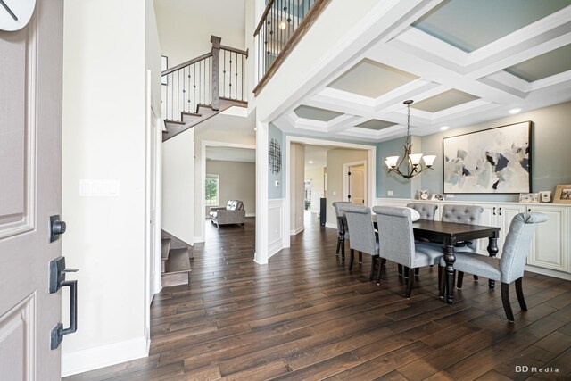 8500 Dungarvan Rd, Frankfort, IL 60423 - dining space featuring dark wood-style flooring, stairs, a chandelier, coffered ceiling, and a wall mounted air conditioner