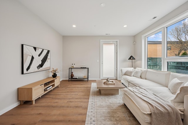 944 Beloit Ave Unit 3, Forest Park, IL 60130 - living room featuring light wood finished floors, baseboards, and recessed lighting