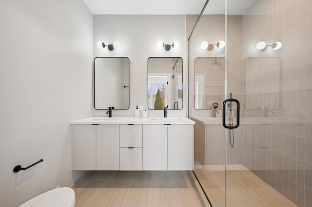 944 Beloit Ave Unit 3, Forest Park, IL 60130 - full bathroom with a stall shower, double vanity, and toilet