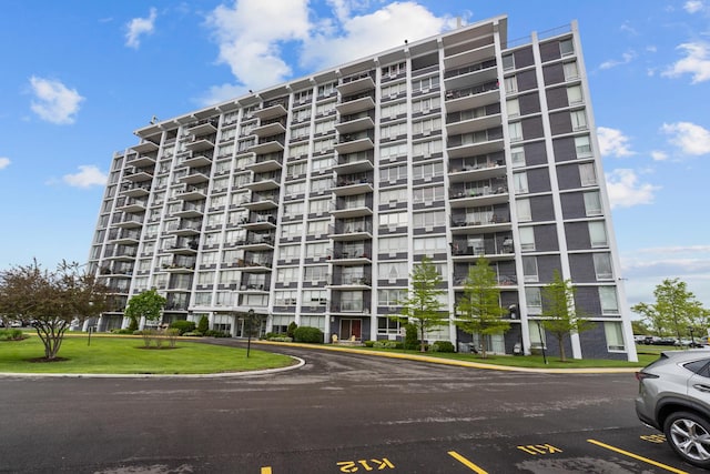 8815 W Golf Rd Unit 7A, Niles, IL 60714 - view of apartment building / complex with uncovered parking