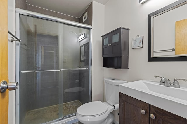 8815 W Golf Rd Unit 7A, Niles, IL 60714 - bathroom with toilet, vanity, and a stall shower