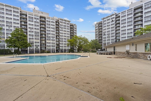 8815 W Golf Rd Unit 7A, Niles, IL 60714 - community pool featuring a patio area
