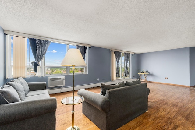8815 W Golf Rd Unit 7A, Niles, IL 60714 - living room with a textured ceiling, wood finished floors, baseboards, a wall mounted air conditioner, and baseboard heating