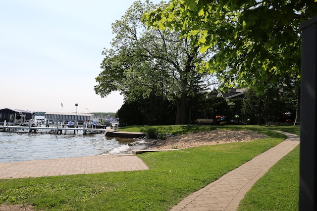 N2335 Main Rd, Lake Geneva, WI 53147 - dock featuring a water view and a lawn
